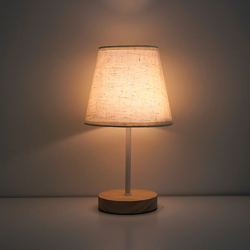 Modern Minimalist Trapezoidal Solid Wood Fabric LED Table Lamp For Bedroom
