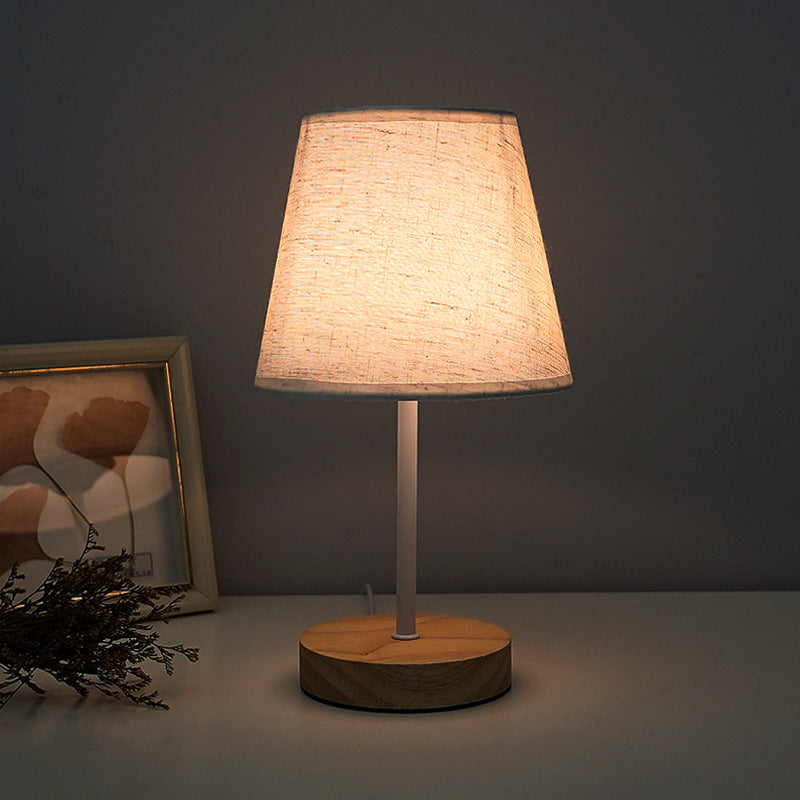 Modern Minimalist Trapezoidal Solid Wood Fabric LED Table Lamp For Bedroom