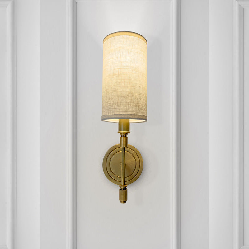 Modern Minimalist Linen Brass Round Cylindrical 1-Light Wall Sconce Lamp For Bedroom