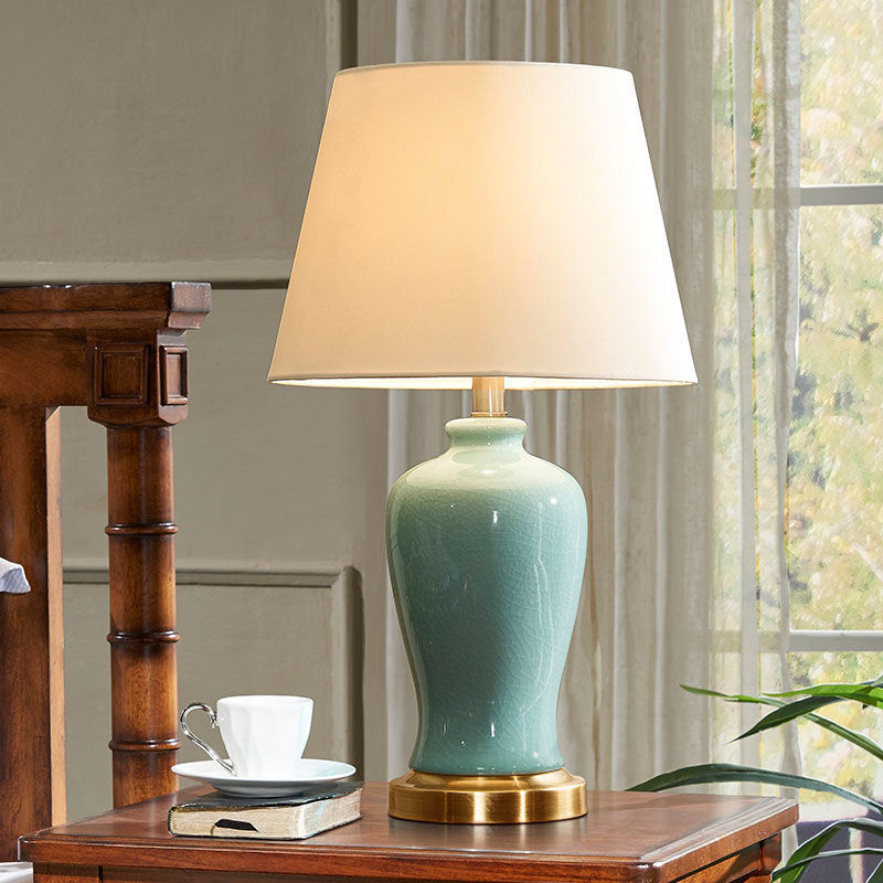 Contemporary Nordic Ceramic Fabric Elliptical Base 1-Light Table Lamp For Bedroom And Living Room