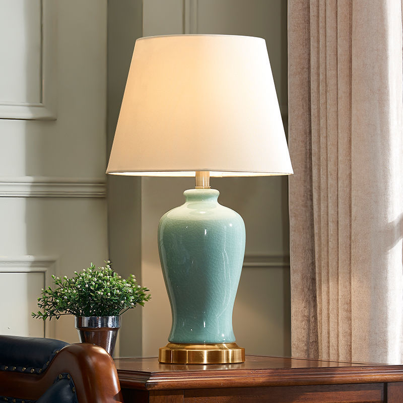 Contemporary Nordic Ceramic Fabric Elliptical Base 1-Light Table Lamp For Bedroom And Living Room