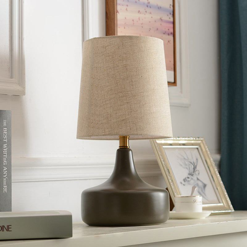 Contemporary Scandinavian Brass Ceramic Fabric Tapered Cylindrical Shade 1-Light Table Lamp For Bedroom And Study