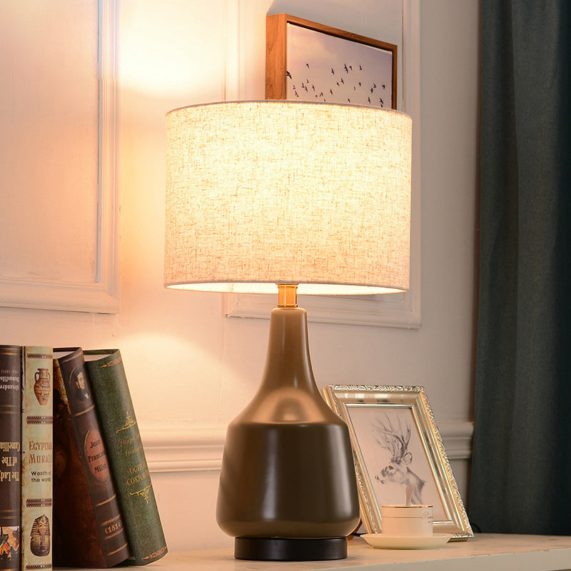 Contemporary Scandinavian Brass Ceramic Fabric Tapered Cylindrical Shade 1-Light Table Lamp For Bedroom And Study