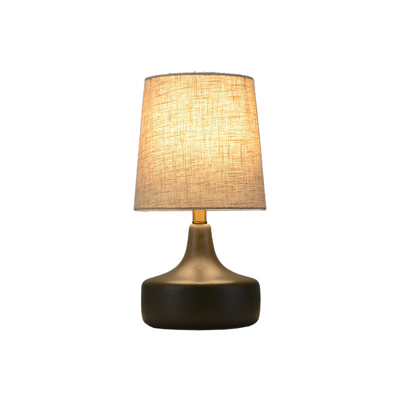 Contemporary Scandinavian Brass Ceramic Fabric Tapered Cylindrical Shade 1-Light Table Lamp For Bedroom And Study
