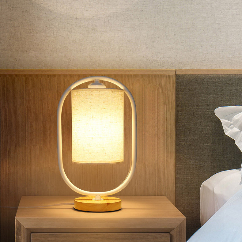 Contemporary Scandinavian Oval Cylinder Solid Wood Metal Fabric 1-Light Table Lamp For Bedroom