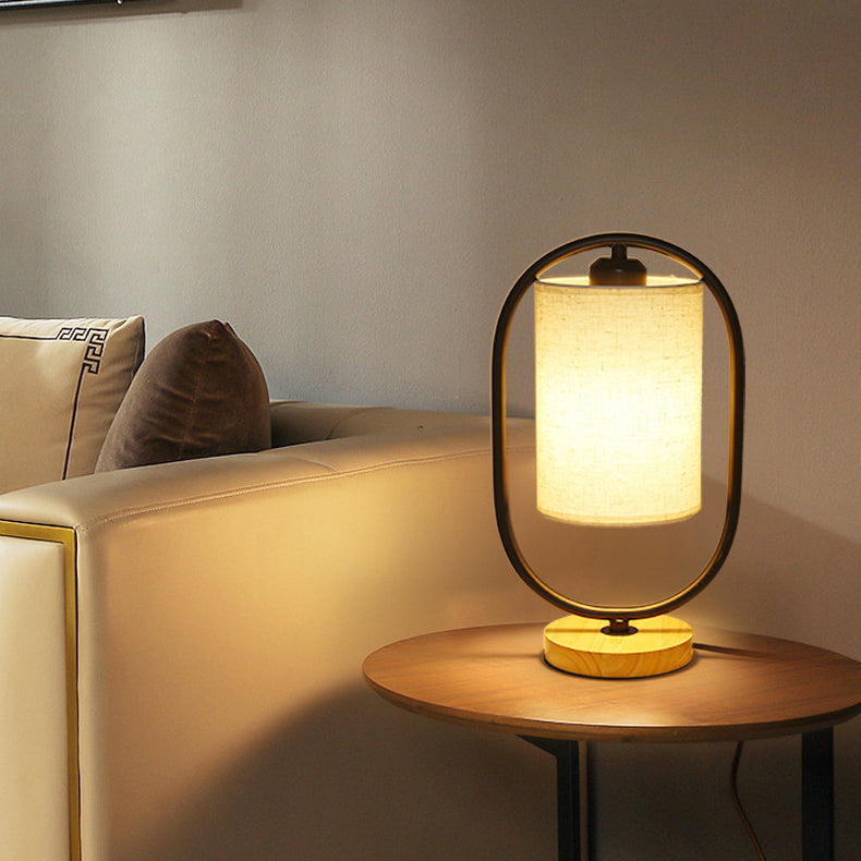 Contemporary Scandinavian Oval Cylinder Solid Wood Metal Fabric 1-Light Table Lamp For Bedroom