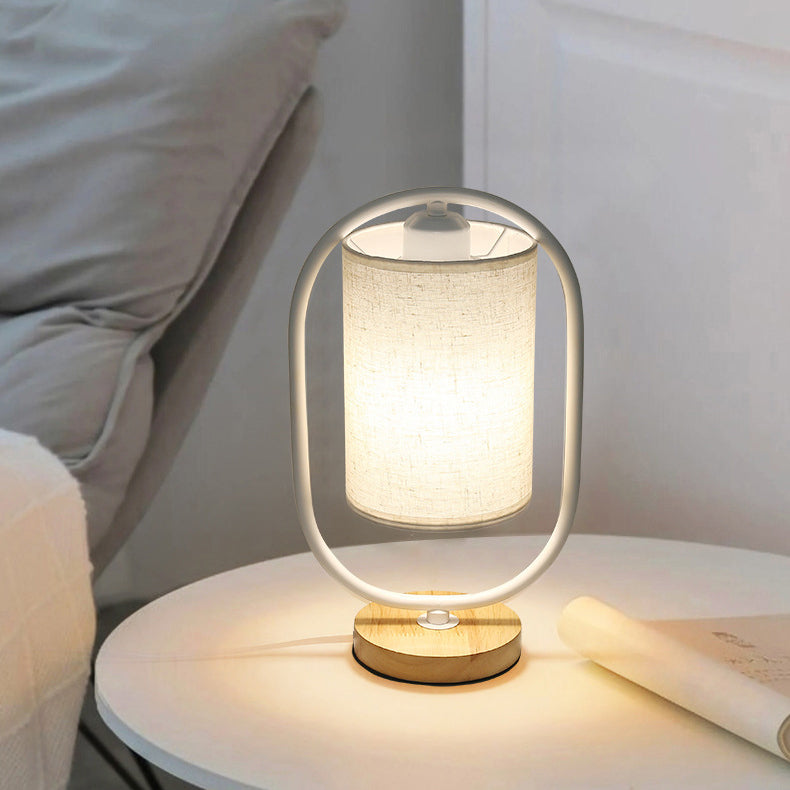 Contemporary Scandinavian Oval Cylinder Solid Wood Metal Fabric 1-Light Table Lamp For Bedroom