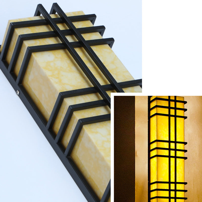 Architectural Wall Sconce in Prairie Style – Amber Frosted Glass & Black Grid Design