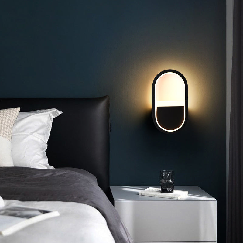 مصباح حائط LED دائري بيضاوي الشكل مصنوع من الحديد والسيليكون بتصميم عصري بسيط لغرفة النوم 