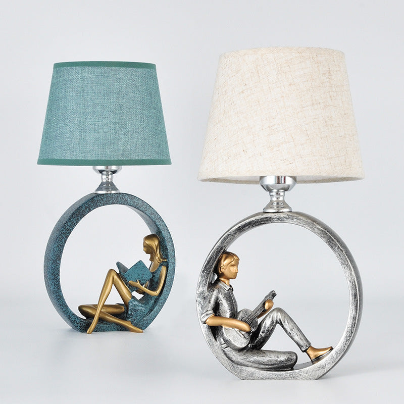 Contemporary Creative Round Girl Boy Resin Fabric 1-Light Table Lamp For Living Room
