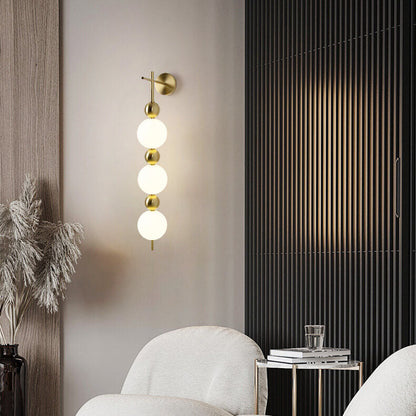مصباح حائط LED بسلسلة من القرع بتصميم بسيط على الطراز الاسكندنافي 