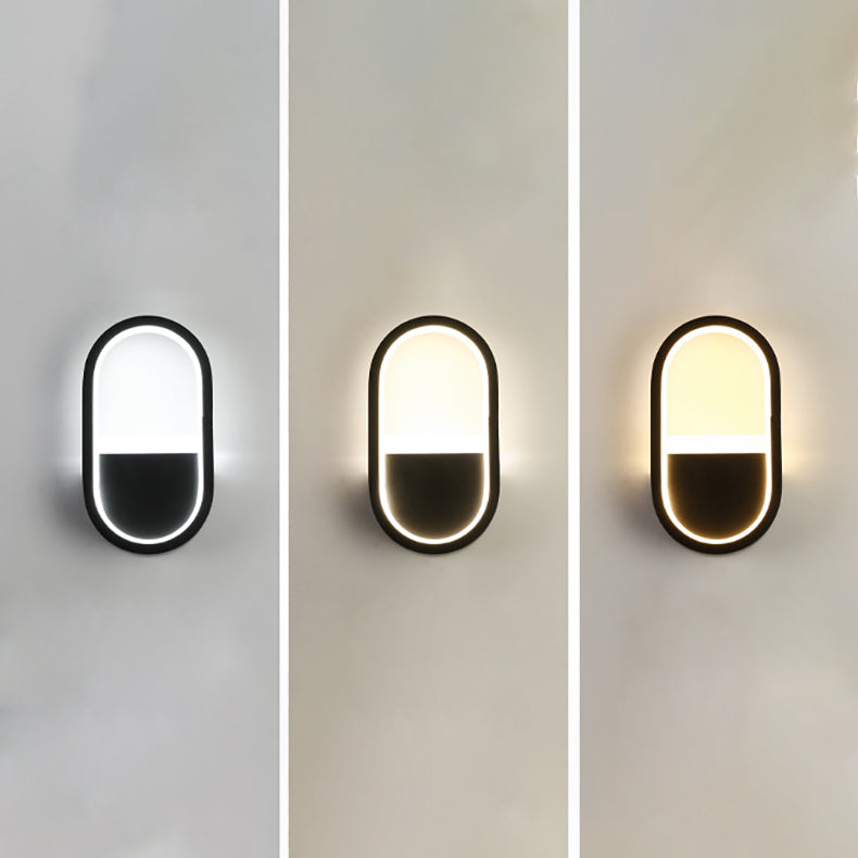 مصباح حائط LED دائري بيضاوي الشكل مصنوع من الحديد والسيليكون بتصميم عصري بسيط لغرفة النوم 