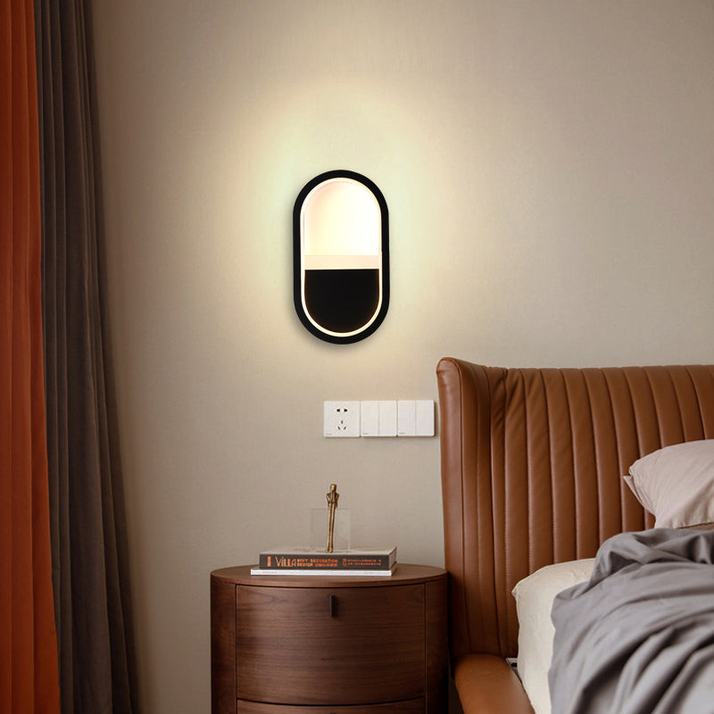 مصباح حائط LED دائري بيضاوي الشكل مصنوع من الحديد والسيليكون بتصميم عصري بسيط لغرفة النوم 
