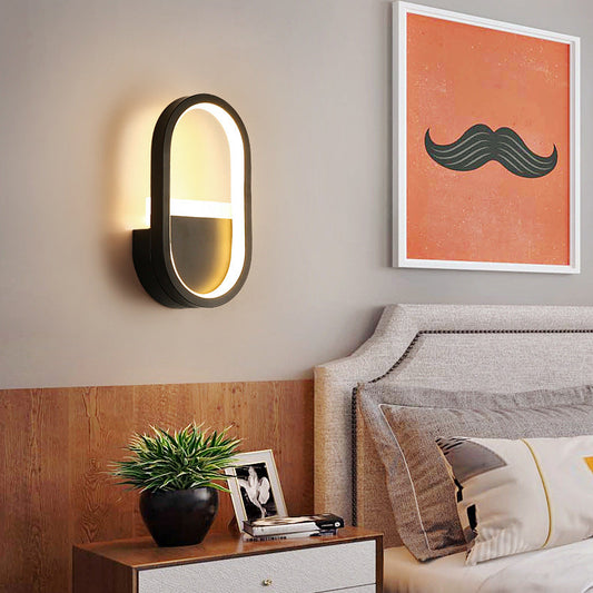 مصباح حائط LED دائري بيضاوي الشكل مصنوع من الحديد والسيليكون بتصميم عصري بسيط لغرفة النوم 