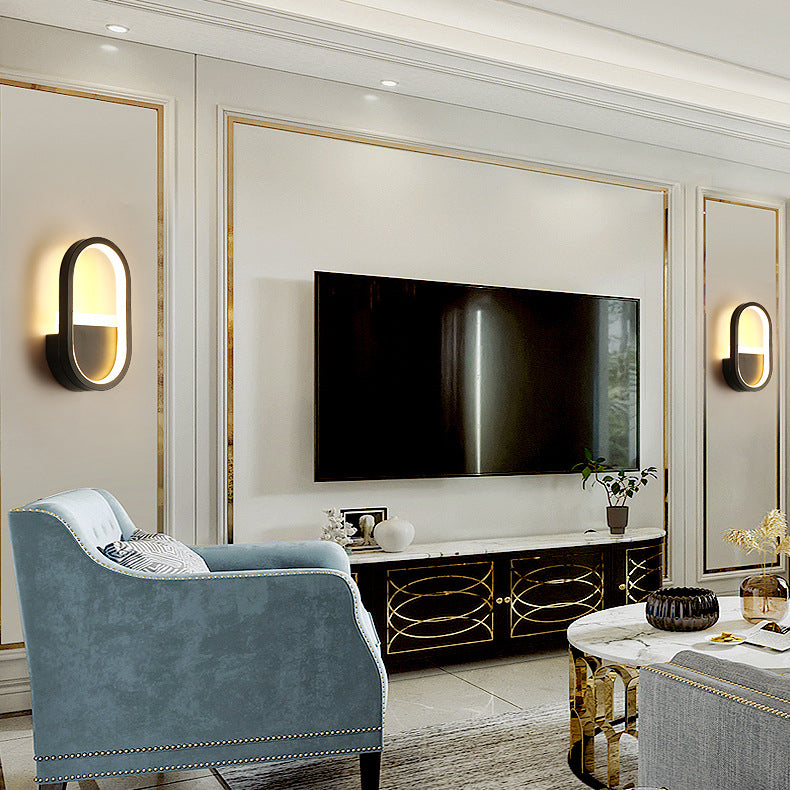 مصباح حائط LED دائري بيضاوي الشكل مصنوع من الحديد والسيليكون بتصميم عصري بسيط لغرفة النوم 