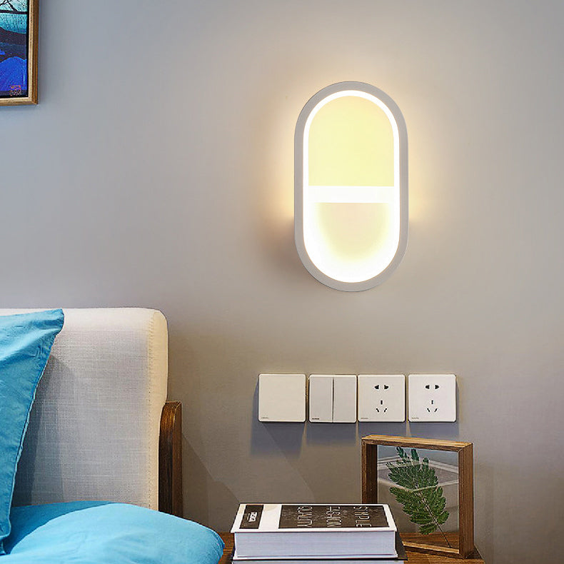 مصباح حائط LED دائري بيضاوي الشكل مصنوع من الحديد والسيليكون بتصميم عصري بسيط لغرفة النوم 