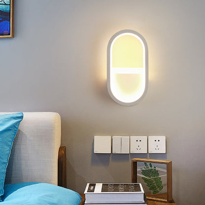 مصباح حائط LED دائري بيضاوي الشكل مصنوع من الحديد والسيليكون بتصميم عصري بسيط لغرفة النوم 