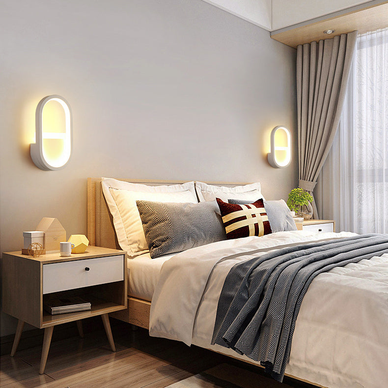 مصباح حائط LED دائري بيضاوي الشكل مصنوع من الحديد والسيليكون بتصميم عصري بسيط لغرفة النوم 
