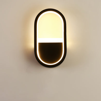 مصباح حائط LED دائري بيضاوي الشكل مصنوع من الحديد والسيليكون بتصميم عصري بسيط لغرفة النوم 