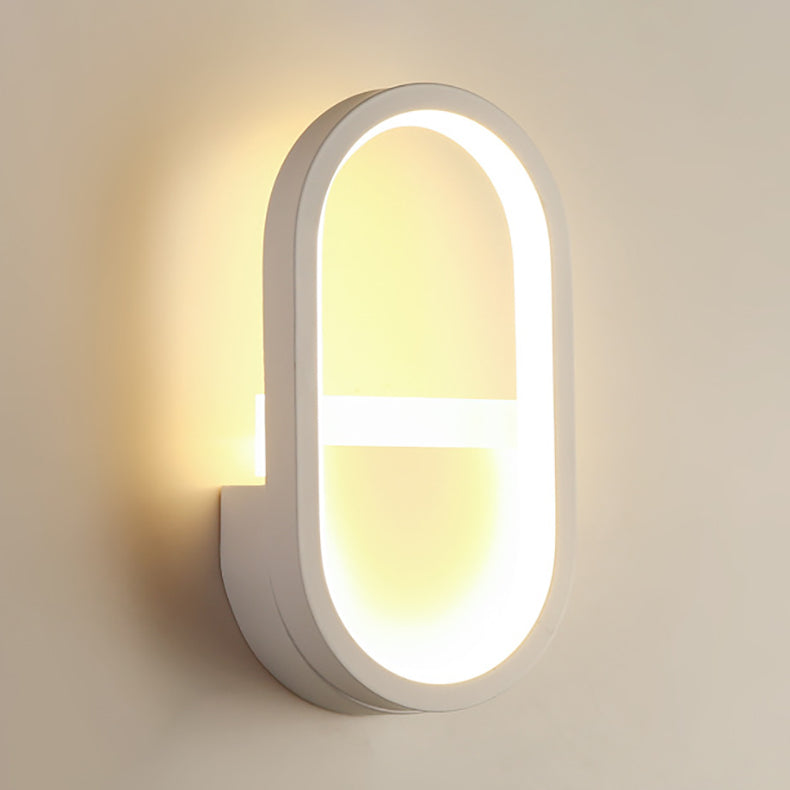 مصباح حائط LED دائري بيضاوي الشكل مصنوع من الحديد والسيليكون بتصميم عصري بسيط لغرفة النوم 