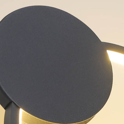 مصباح LED دائري هندسي من الحديد بتصميم بسيط وعصري لغرفة النوم 