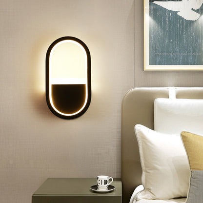 مصباح حائط LED دائري بيضاوي الشكل مصنوع من الحديد والسيليكون بتصميم عصري بسيط لغرفة النوم 