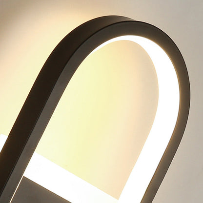 مصباح حائط LED دائري بيضاوي الشكل مصنوع من الحديد والسيليكون بتصميم عصري بسيط لغرفة النوم 