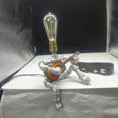 Industrial Plumbing Guitar Robot 1-Light Table Lamp