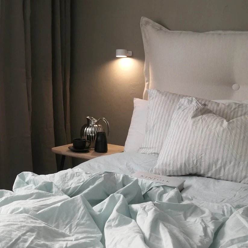 Infinity Wall Lamp bedside lifestyle image