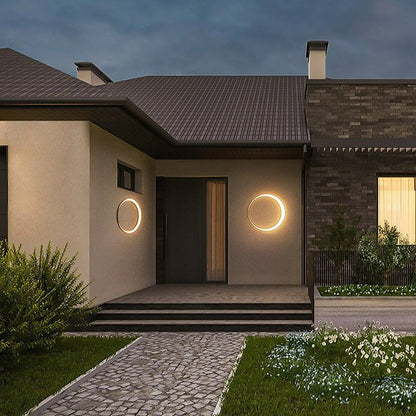مصباح حائط LED مصنوع من الفولاذ المقاوم للصدأ المقاوم للماء بتصميم دائري بسيط عصري للفناء الخارجي 