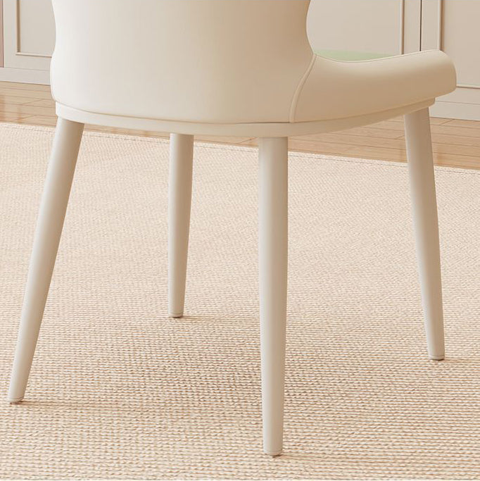 Modern Minimalist PU Leather Carbon Steel Curved Back Dining Chair Backrest Armless For Dining Room