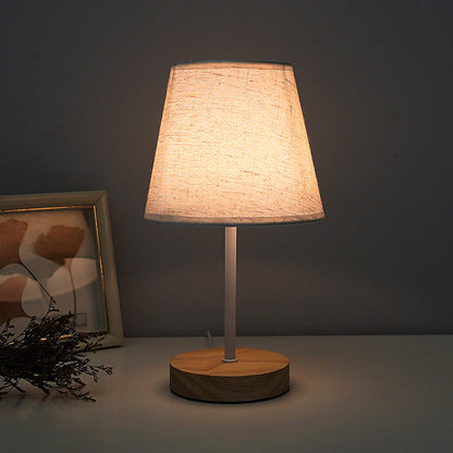 Modern Minimalist Trapezoidal Solid Wood Fabric LED Table Lamp For Bedroom