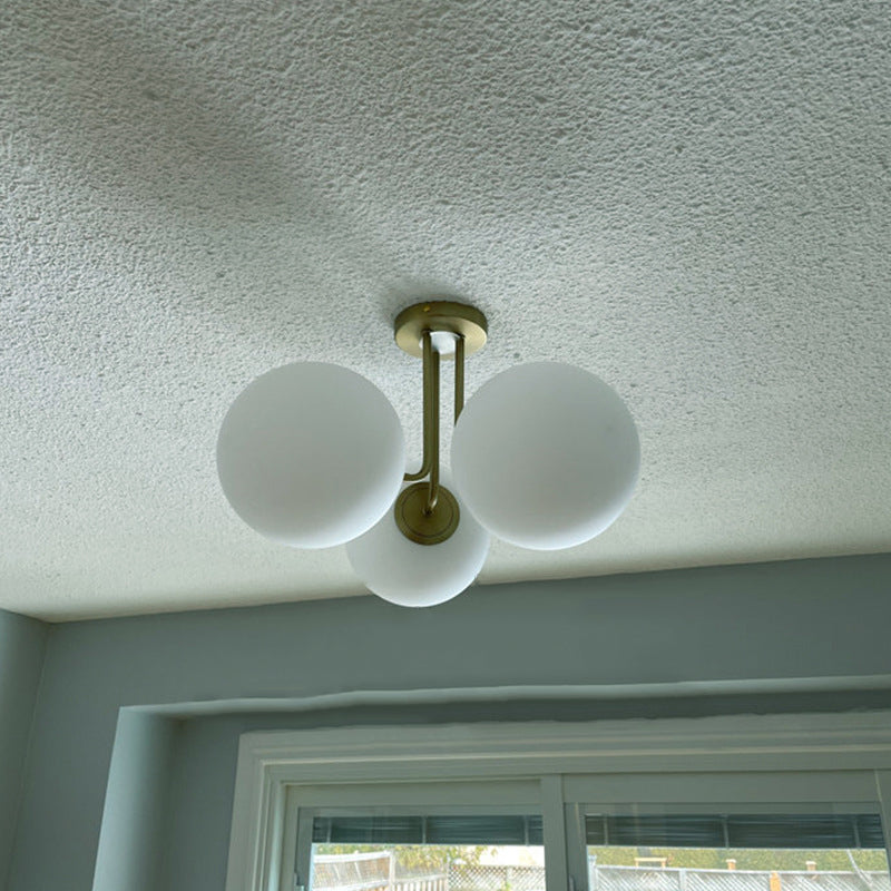 Contemporary Scandinavian Brass Glass Globe 3-Light Semi-Flush Mount Ceiling Light For Bedroom & Living Room