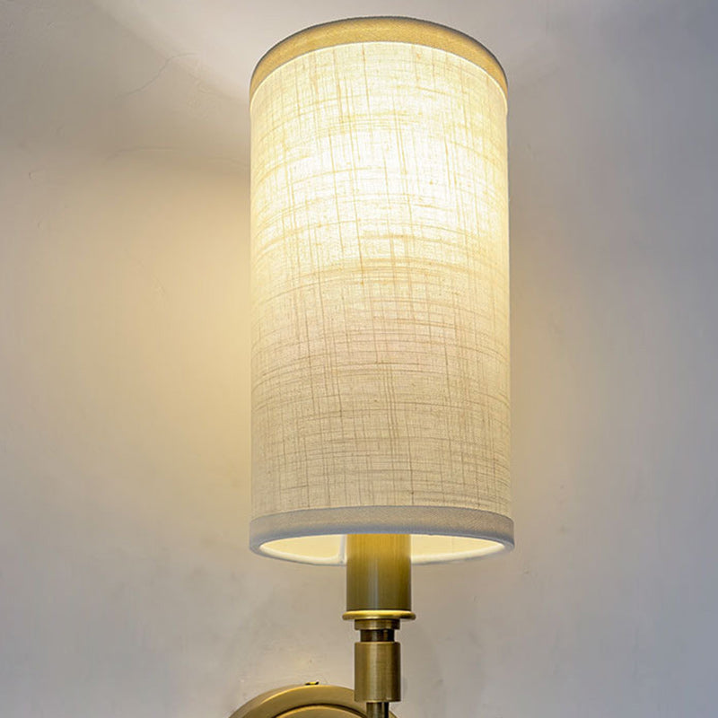 Modern Minimalist Linen Brass Round Cylindrical 1-Light Wall Sconce Lamp For Bedroom