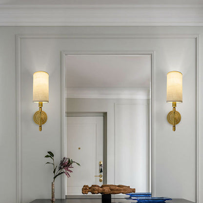 Modern Minimalist Linen Brass Round Cylindrical 1-Light Wall Sconce Lamp For Bedroom