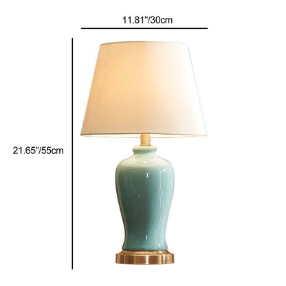 Contemporary Nordic Ceramic Fabric Elliptical Base 1-Light Table Lamp For Bedroom And Living Room