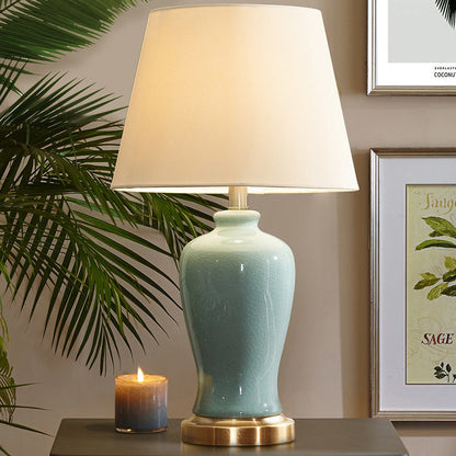 Contemporary Nordic Ceramic Fabric Elliptical Base 1-Light Table Lamp For Bedroom And Living Room