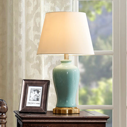 Contemporary Nordic Ceramic Fabric Elliptical Base 1-Light Table Lamp For Bedroom And Living Room