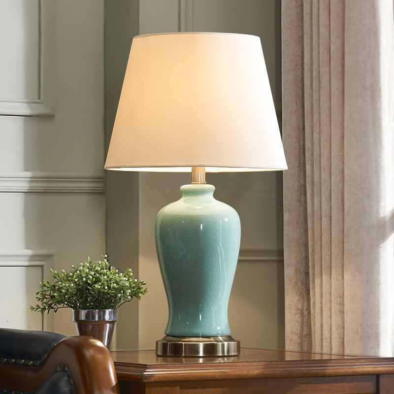 Contemporary Nordic Ceramic Fabric Elliptical Base 1-Light Table Lamp For Bedroom And Living Room