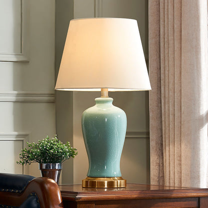 Contemporary Nordic Ceramic Fabric Elliptical Base 1-Light Table Lamp For Bedroom And Living Room