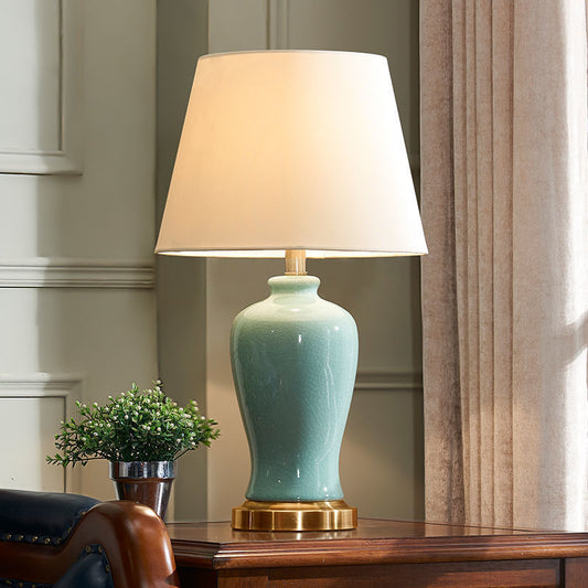 Contemporary Nordic Ceramic Fabric Elliptical Base 1-Light Table Lamp For Bedroom And Living Room
