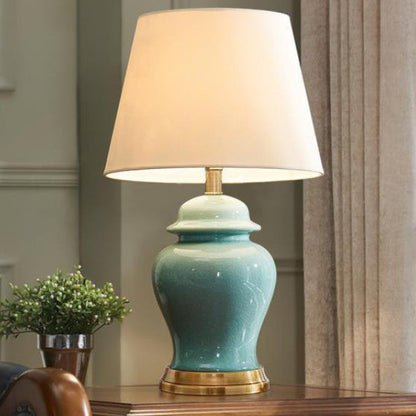 Contemporary Nordic Ceramic Fabric Elliptical Base 1-Light Table Lamp For Bedroom And Living Room