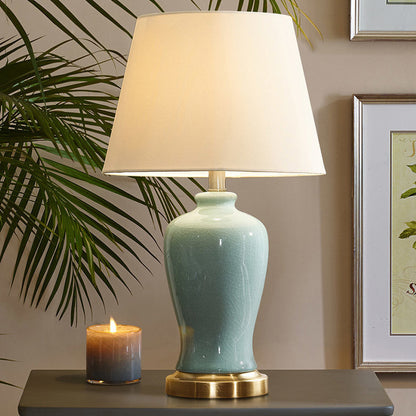 Contemporary Nordic Ceramic Fabric Elliptical Base 1-Light Table Lamp For Bedroom And Living Room