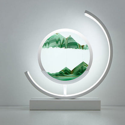 Modern Art Deco Round Quicksand Iron Glass LED Table Lamp For Bedroom