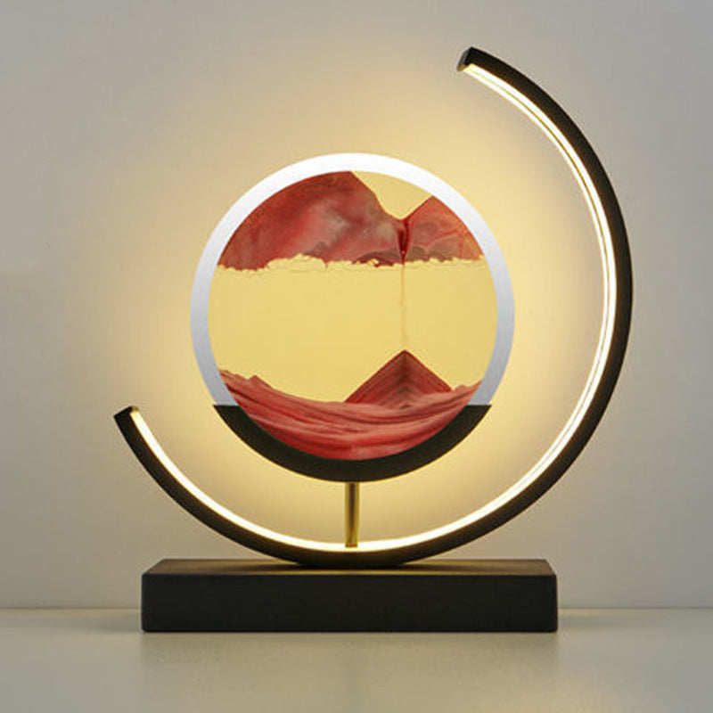 Modern Art Deco Round Quicksand Iron Glass LED Table Lamp For Bedroom