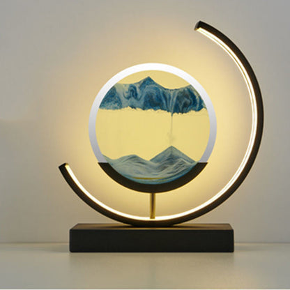 Modern Art Deco Round Quicksand Iron Glass LED Table Lamp For Bedroom