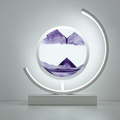 Modern Art Deco Round Quicksand Iron Glass LED Table Lamp For Bedroom