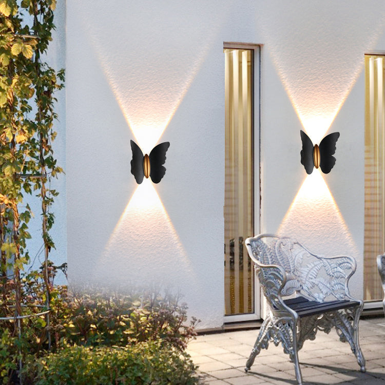 مصباح حائط LED من الألومنيوم المقاوم للماء على شكل فراشة بتصميم عصري بسيط للفناء الخارجي 