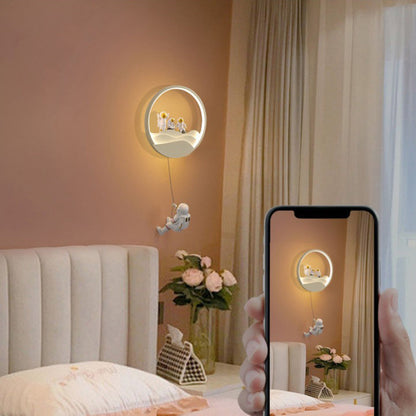 Contemporary Creative Kids Astronaut Rotating Lunar Eclipse Silicone Resin Aluminum LED Wall Sconce Lamp For Bedroom