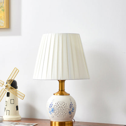 Traditional Chinese Round Table Ball Flower Hollowed Metal Ceramic Fabric 1-Light Table Lamp For Bedroom